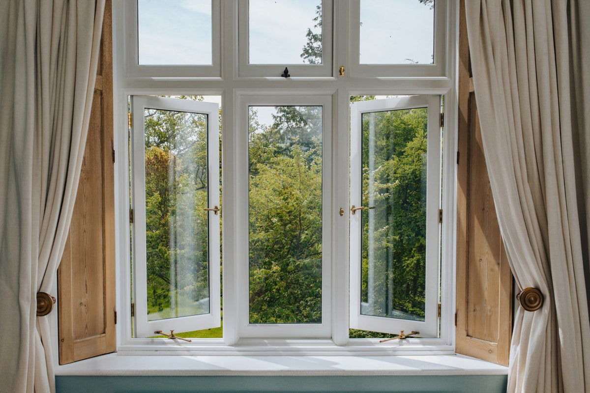 Transform Your Space with Unique Curtain Rods, Tiebacks, and Shutter Dogs - Old West Iron