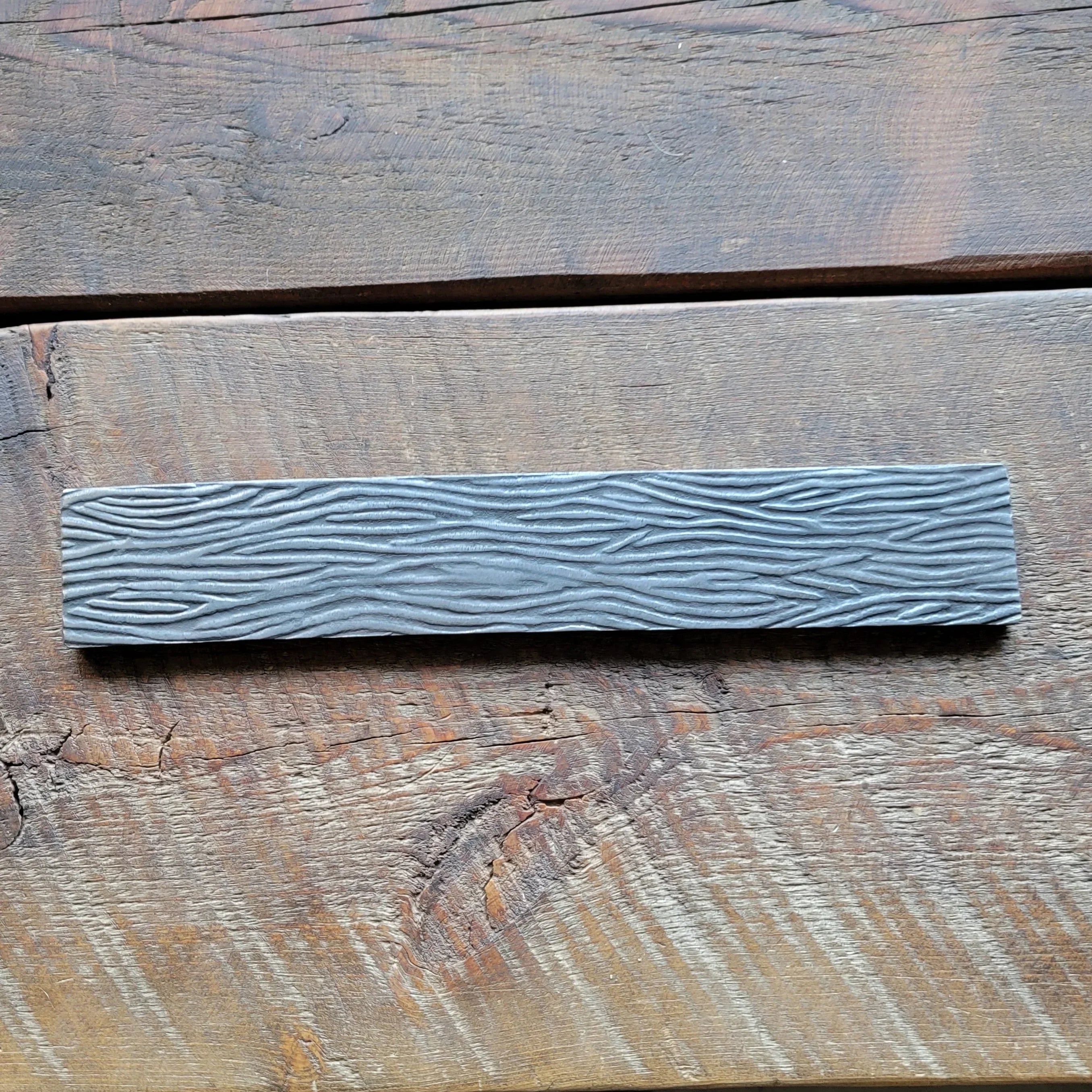 Embossed Strapping - Old West Iron