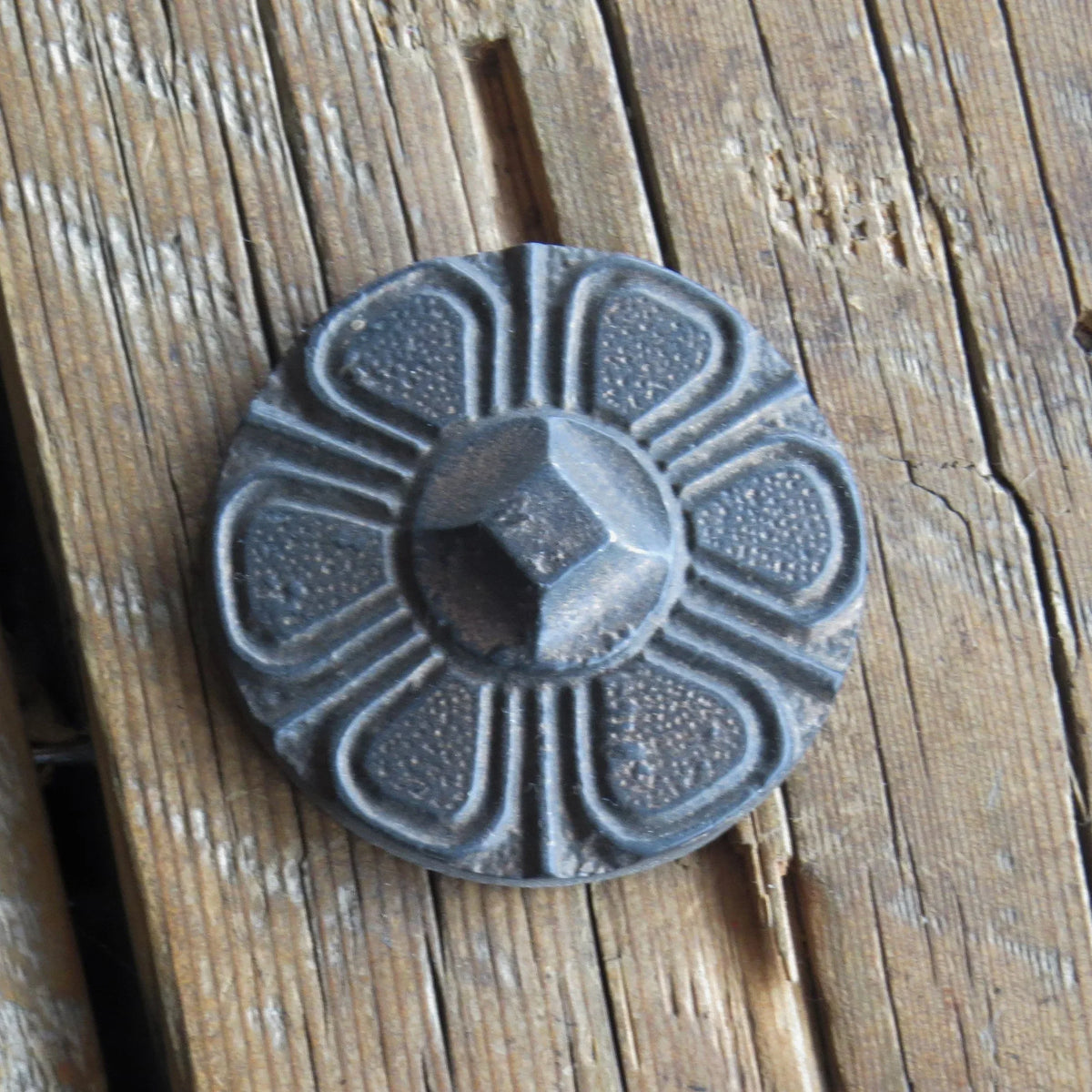 2 1/8" Round Embossed Iron Nail - Old West Iron