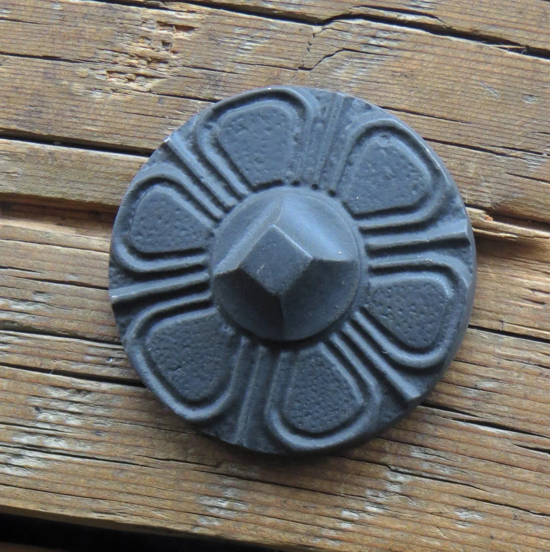 1 1/8" Round Embossed Iron Nail - Old West Iron